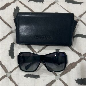 CHANEL Elegant Black Sunglasses with Case